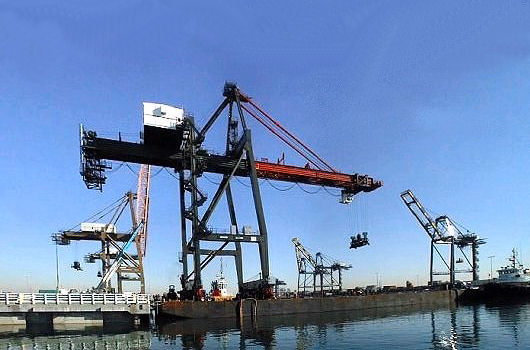 Barge relocating Hitachi crane in LA
