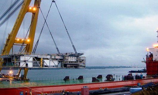 Mad Dog DSM lifted on by floating crane