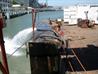 Deballasting of side barges